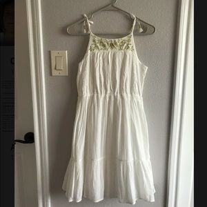 White dress with gold floral embroidery